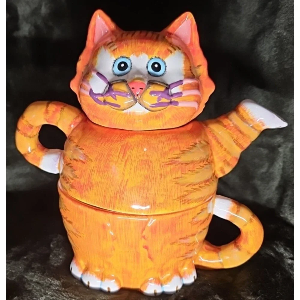 3 Piece‎ Teapot, Cat head as lid, Teapot, and Cup underneath. Unique